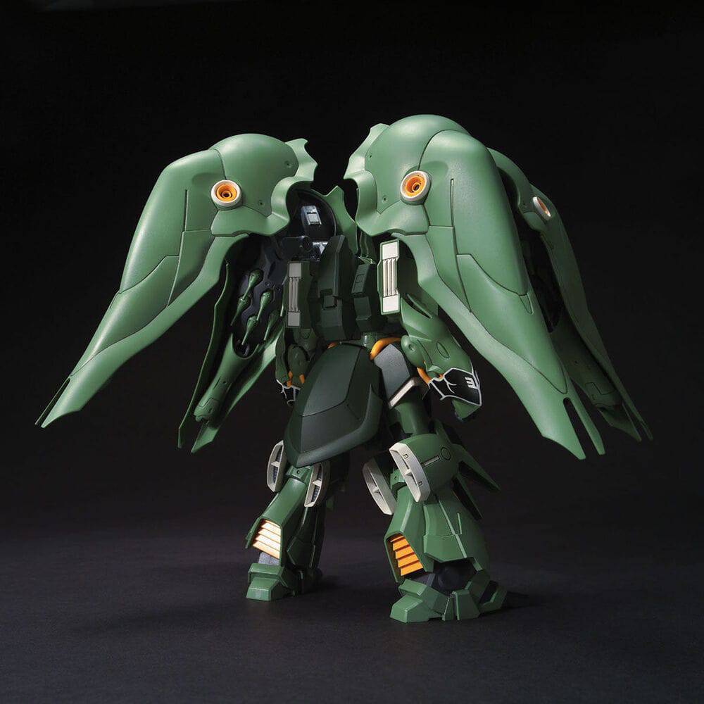 Green robot with large wings on a black background